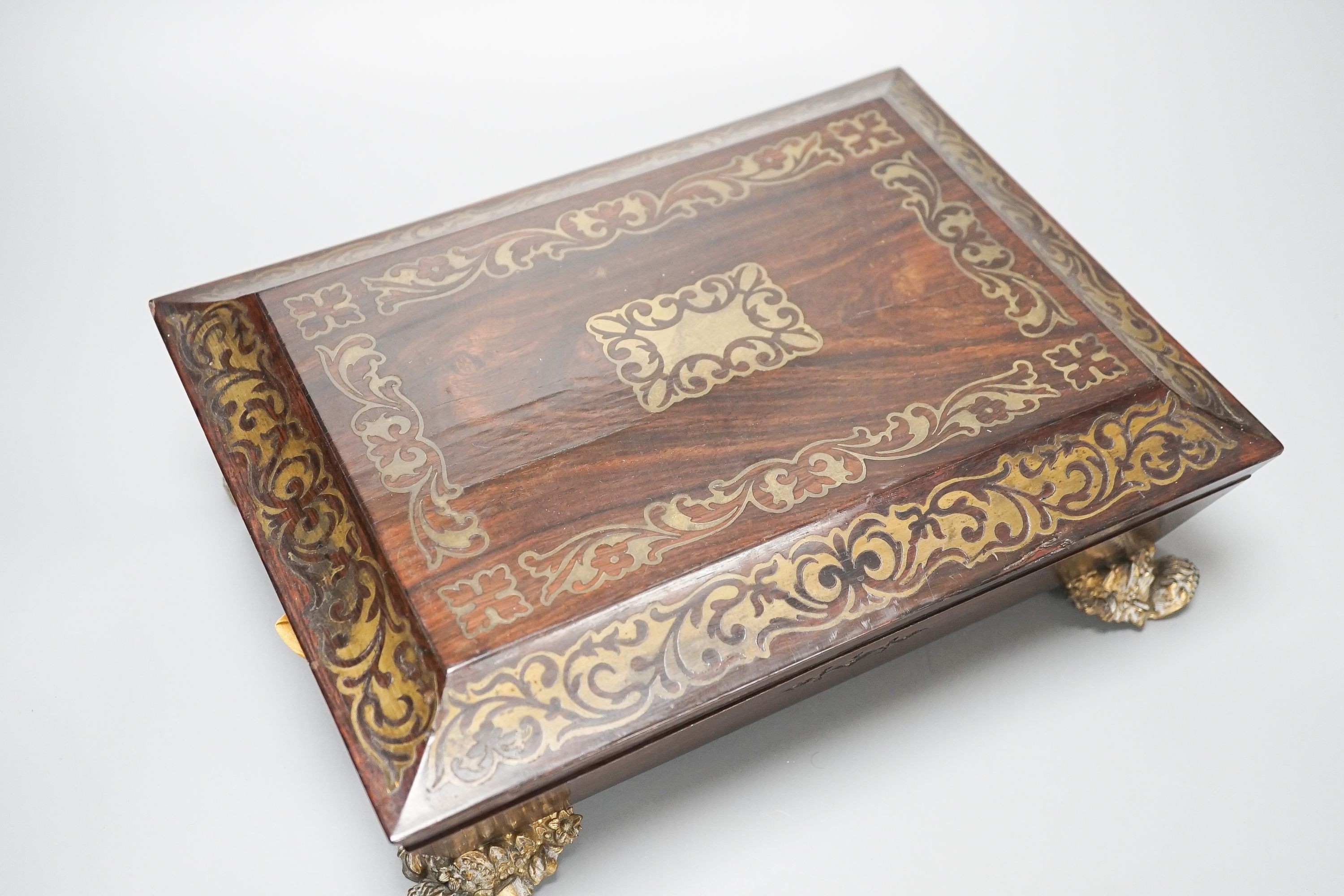 A William IV cut brass inlaid rosewood games box 30.5cm, containing Reynolds & Sons woodblock and stencil playing cards c.1830-50